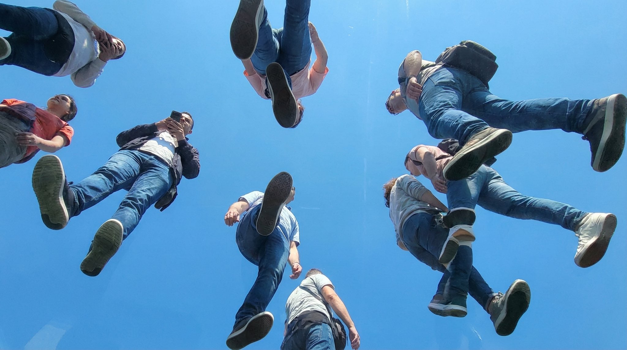 Photography AI image prompt preview: View from under a plane of completely transparent plexiglass (image 4)